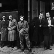 GB. ENGLAND. London. 1958. There had been a hanging that morning in Pentonville prison in north London. A group gathered outside the yet unopened pub opposite the main gate. The executed man had lived nearby and these were some of his friends.