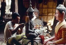 CAMBODIA. Phnom Penh. 1988. On grounds of Proyuvong pagoda, artisans produce religious artifacts.